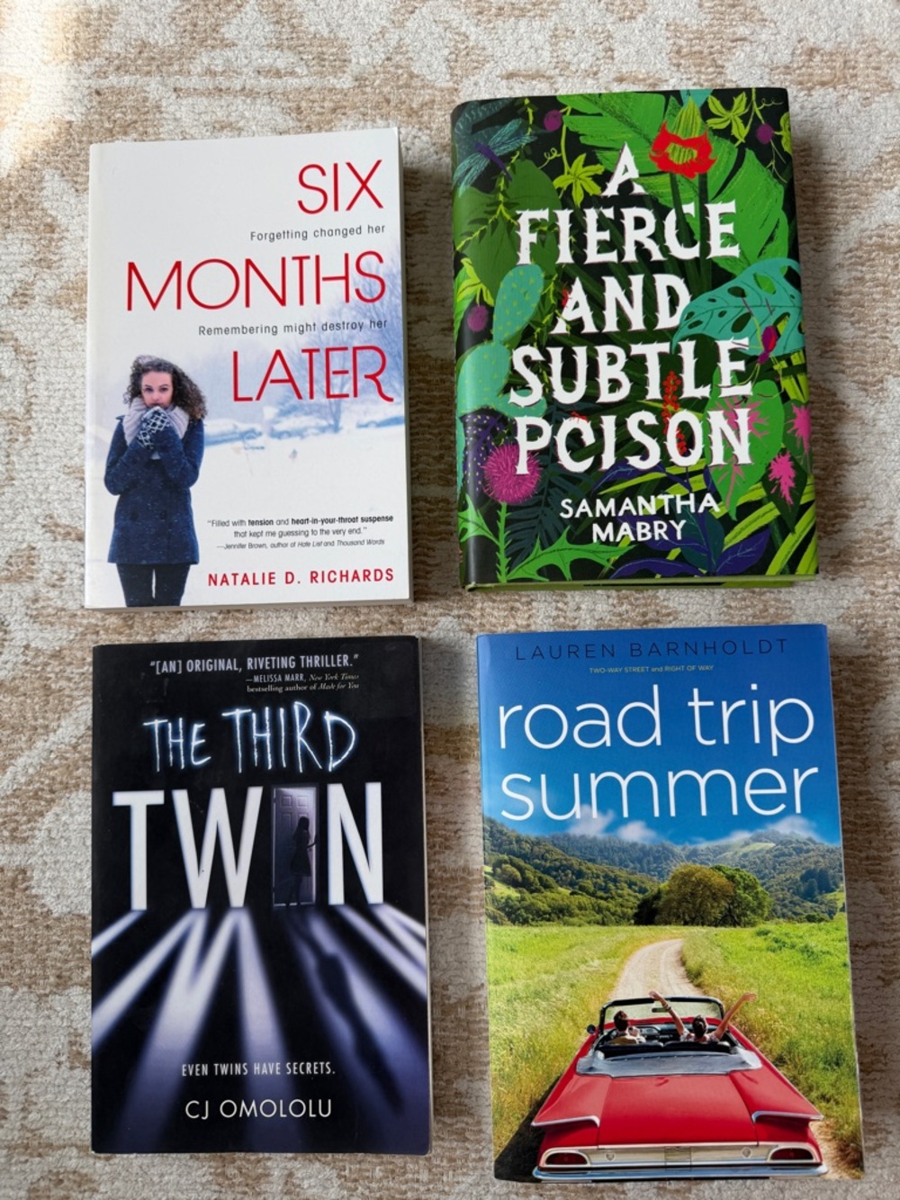 Set of Four Assorted Paperback Books